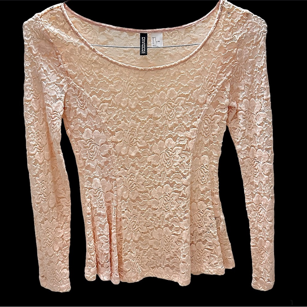 Divided long sleeve peplum top